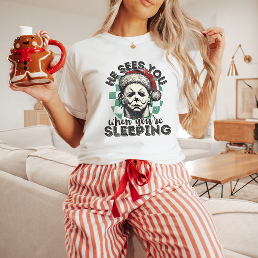 He Sees You When You’re Sleeping Tee