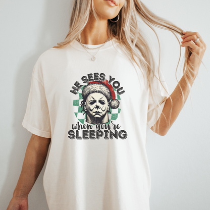 He Sees You When You’re Sleeping Tee